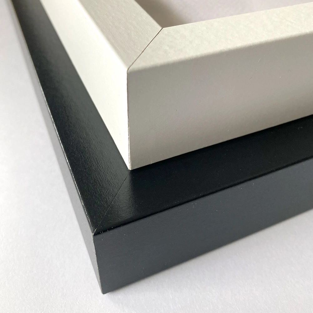 Corners of piled black and white frames